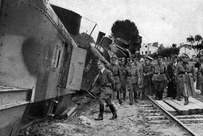 Adolf Hitler heads for a closer look at the second artillery carriage of the destroyed Polish armoured train No 13 General Sosnkowski